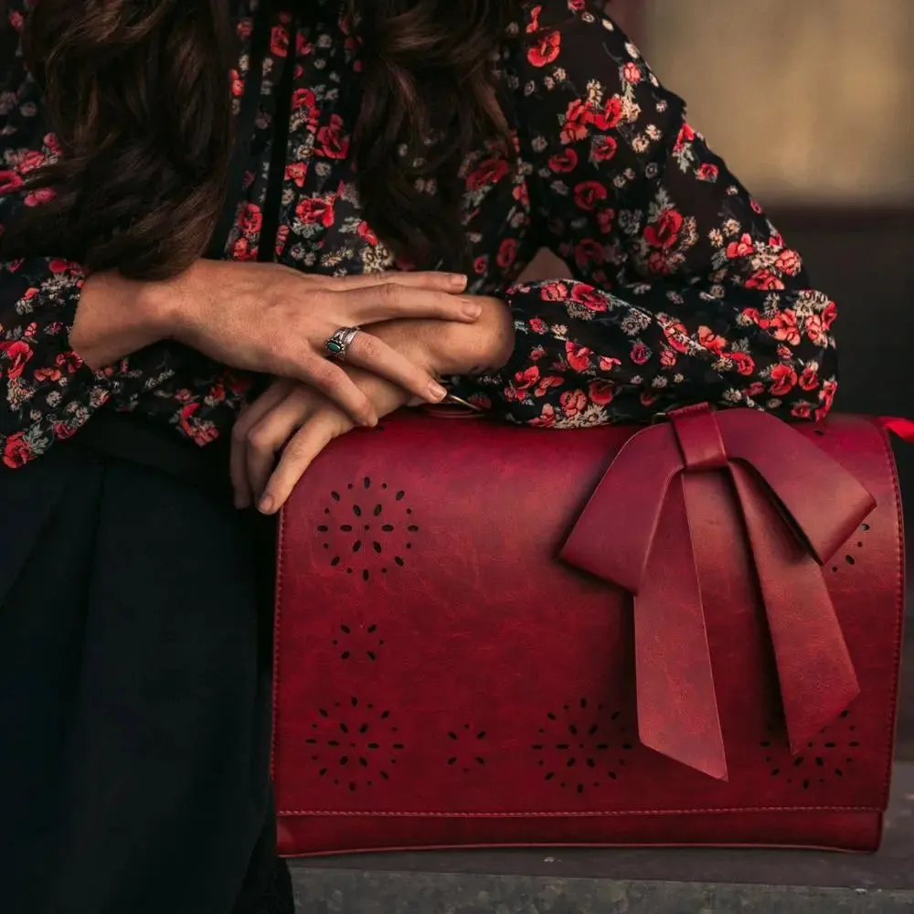 Claire’s Elegant Bow-Tie Satchel