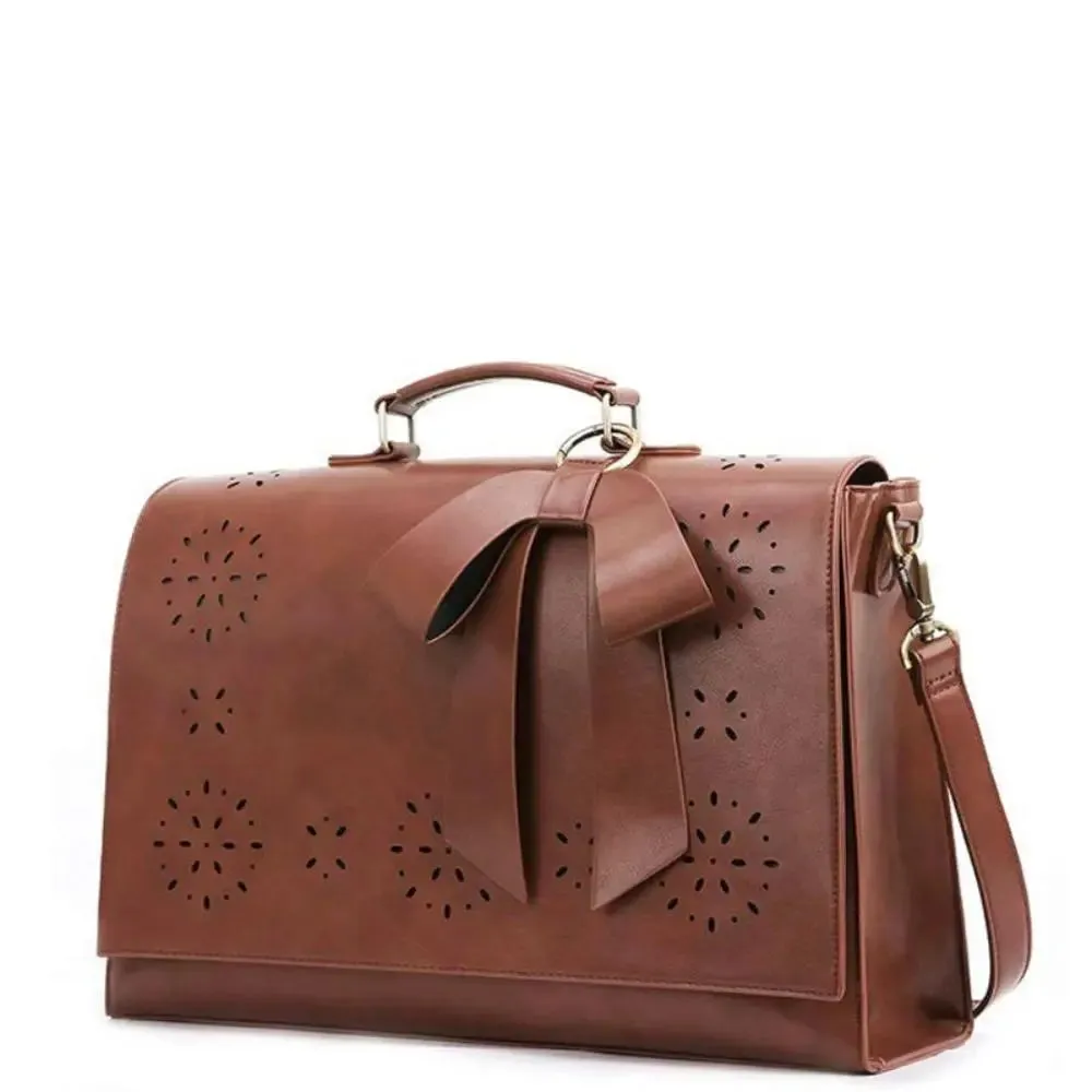 Claire’s Elegant Bow-Tie Satchel