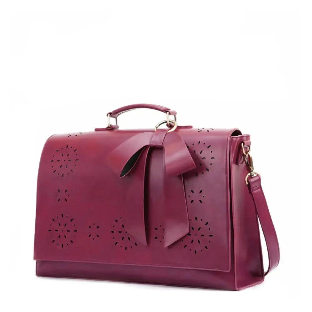 Claire’s Elegant Bow-Tie Satchel