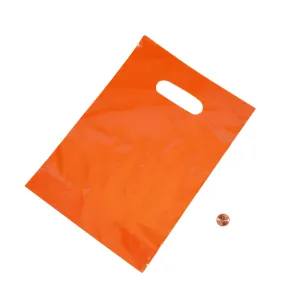 Orange Plastic Treat Bags (100 total plastic treat bags in 2 bags) 12¢ each